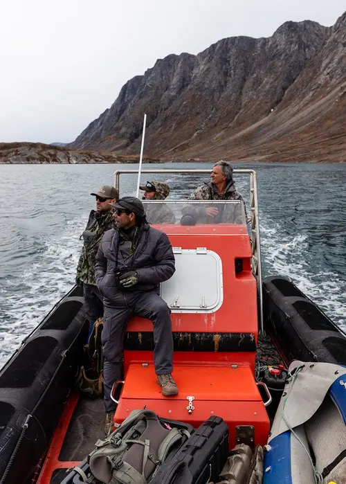 Headed to base camp by boat. 