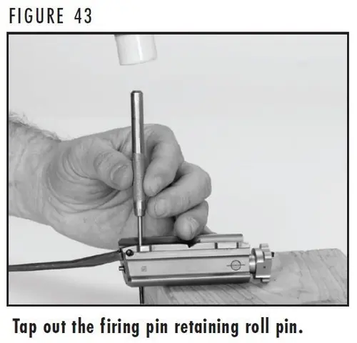 A5 Figure 43 Tapping out Firing pin retaining pin 16 and 20 gauge