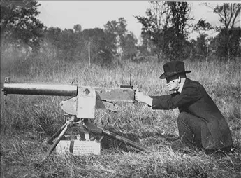 John M. Browning personally tests an early prototype of his water-cooled .50 caliber heavy machine gun.