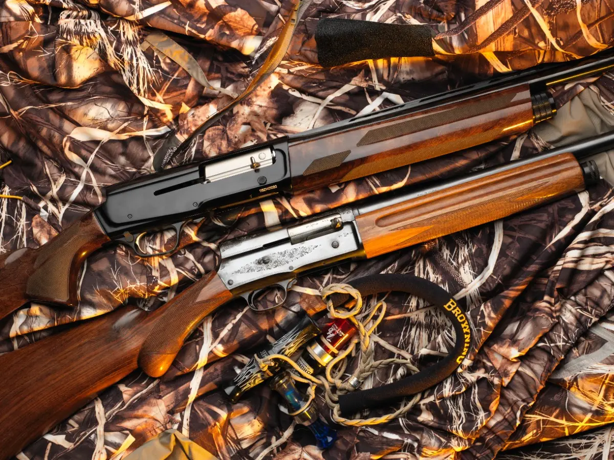 A5 and Auto-5 semi-auto shotguns side by side.