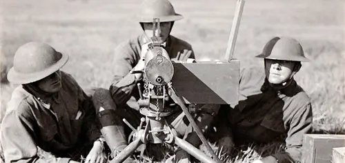 The US Model 1917 Browning machine gun with three soldiers.