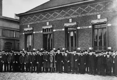 John M. Browning at the factory with workers