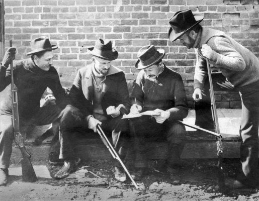 “Four-Bs” trapshooting team sometime in the late 1890s. Left to right are Gus Becker, John and Matt Browning and A.P. Bigelow. Becker holds a Model 1887 while the three others have Browning-designed Winchester pumps.